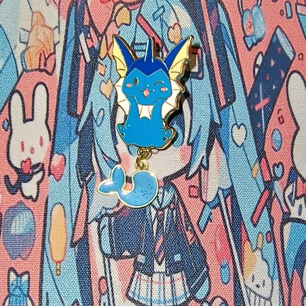 Blue and Yellow Enamel Pin Vaporeon Pokemon Anime Manga Eevee - Picture 4 of 5